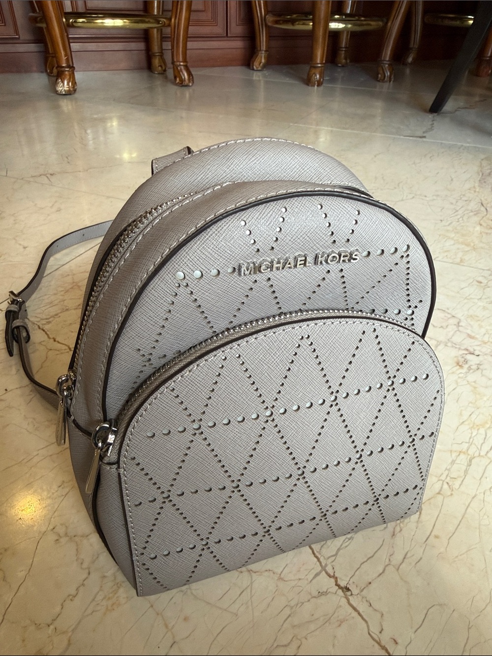 Michael Kors Light Gray Perforated Mini Backpack - Picture 1 of 8